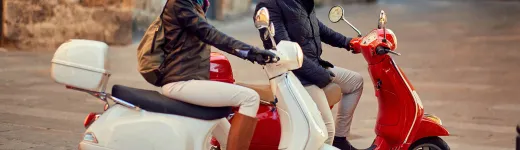 woman and man on scooters 